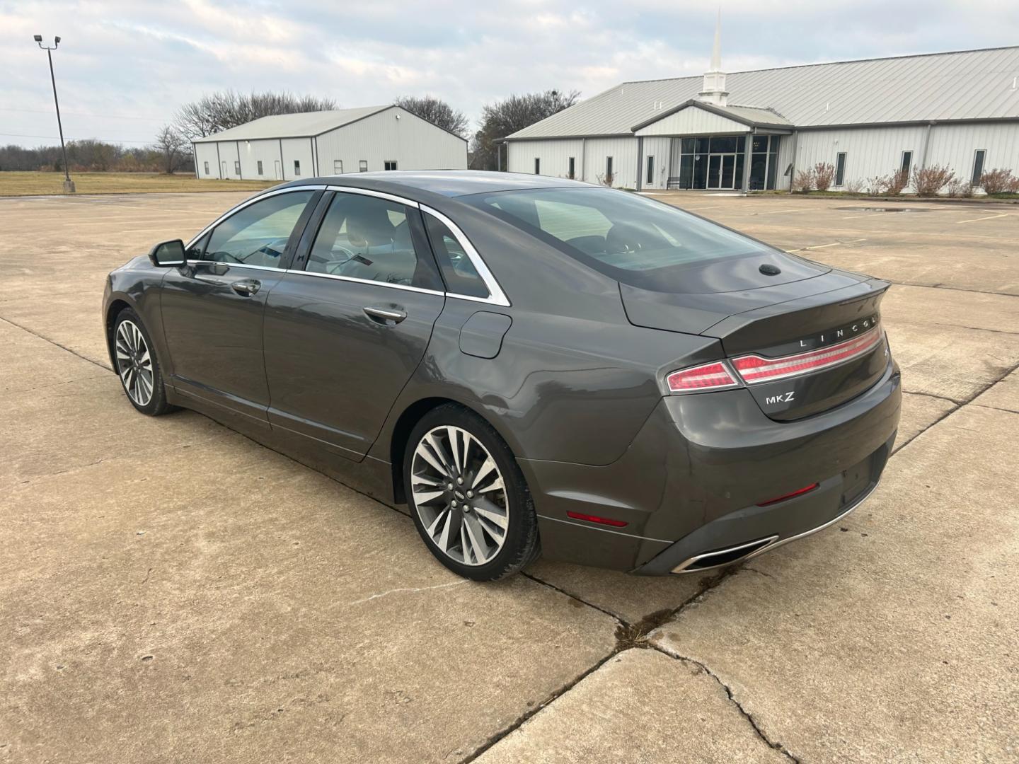 2017 GRAY Lincoln MKZ Select FWD (3LN6L5C98HR) with an 2.0L L4 DOHC 16V engine, 6A transmission, located at 17760 Hwy 62, Morris, OK, 74445, (918) 733-4887, 35.609104, -95.877060 - 2017 LINCOLN MKZ SELECT FWD 2.0L FEATURES POWER SEATS, POWER MIRRORS, POWER WINDOWS, POWER LOCKS, AM/FM STEREO, SIRIUS XM, BLUETOOTH, CD PLAYER, NAVIGATION, LEATHER SEATS, HEATED SEATS, DUAL CLIMATE CONTROL, BACKUP CAMERA, SUNROOF, MULTI-FUNCTIONING STEERING WHEEL CONTROLS, CRUISE CONTROL, TRACTION - Photo#6